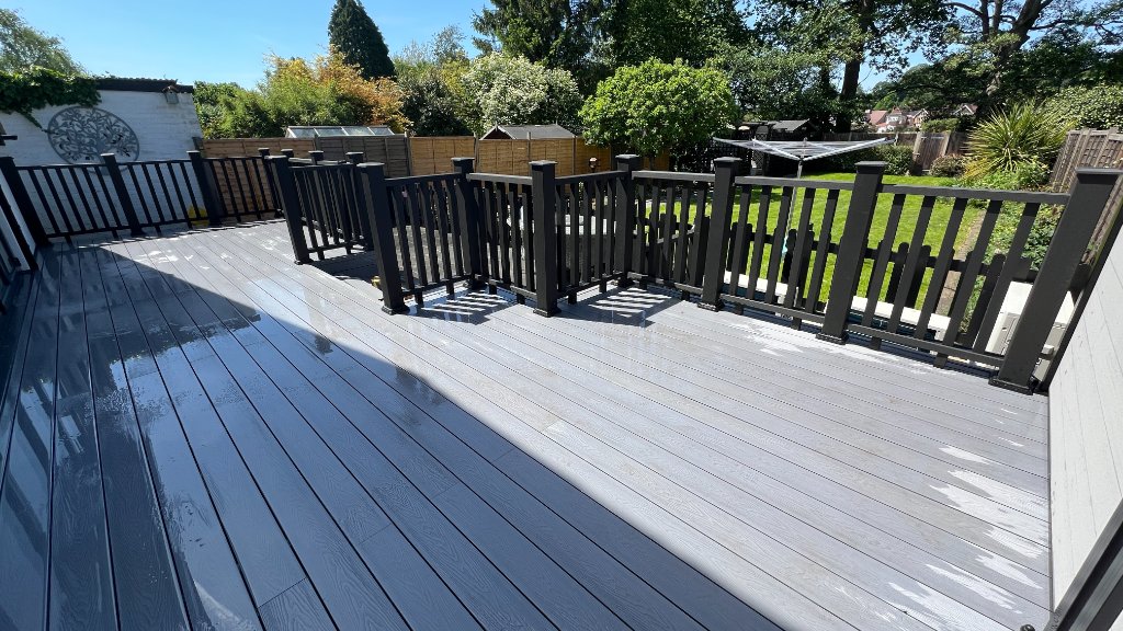 Large composite deck with black balustrade Godalming Surrey