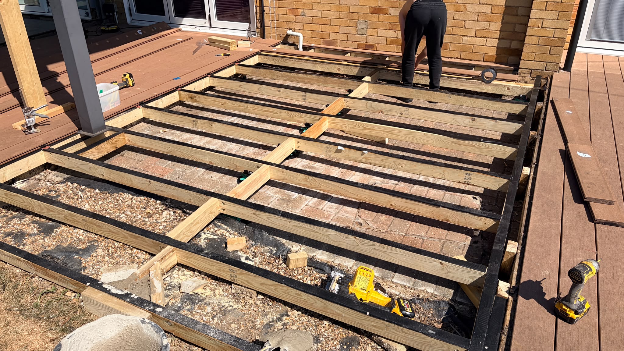 New pressure-treated joist frame with joist tape in East Grinstead