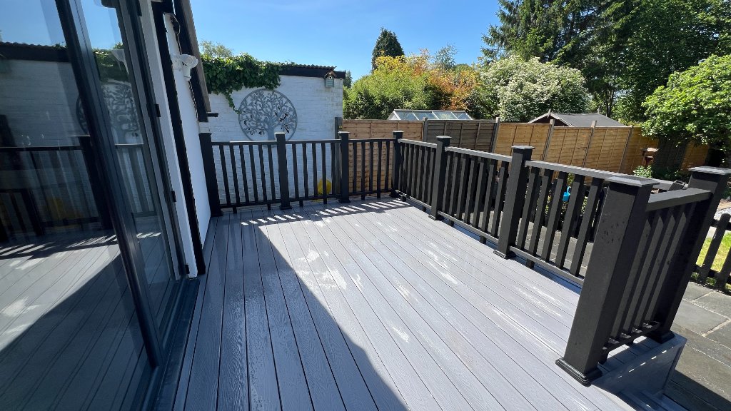Composite deck with black balustrade and integrated steps Manchester
