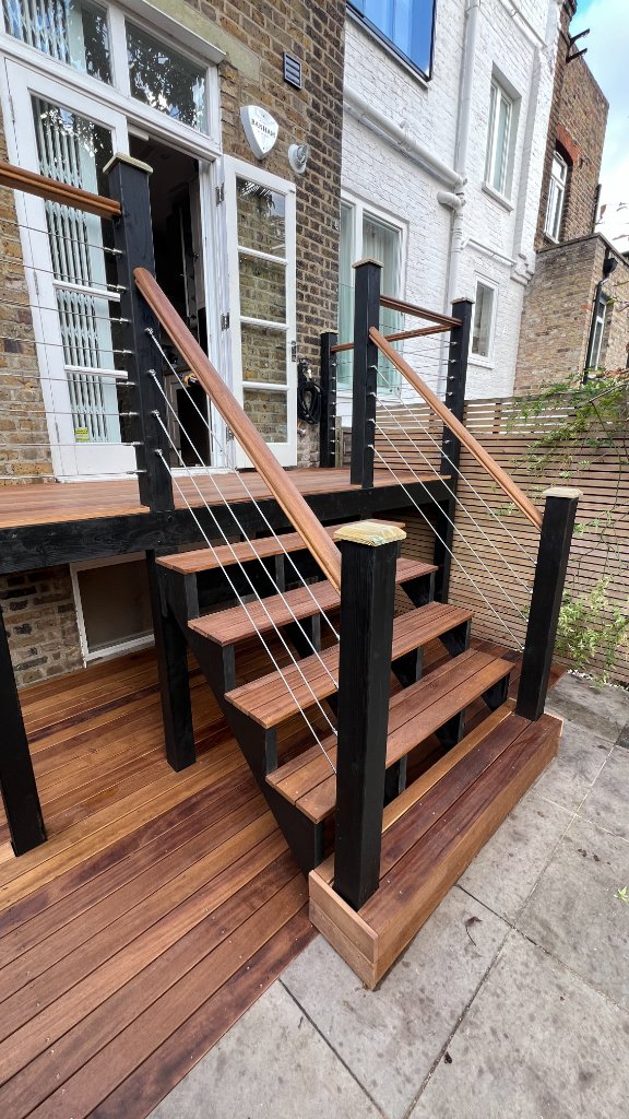 Timber decking with cable rail staircase Manchester