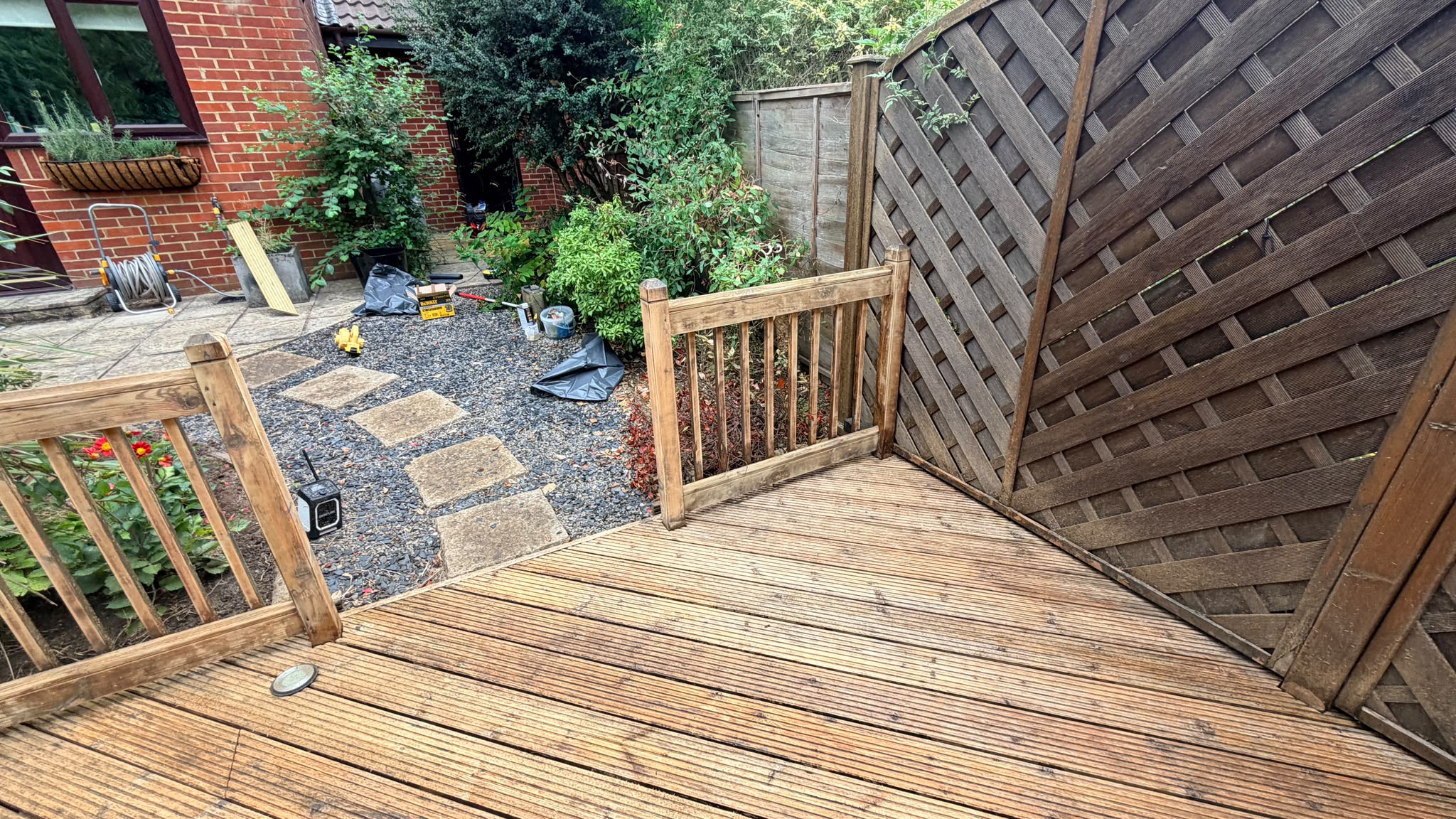 Trout Road Haslemere deck before — gate and stepping stones with materials on site